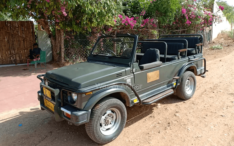 Indian tiger safari jeep viewing a tiger